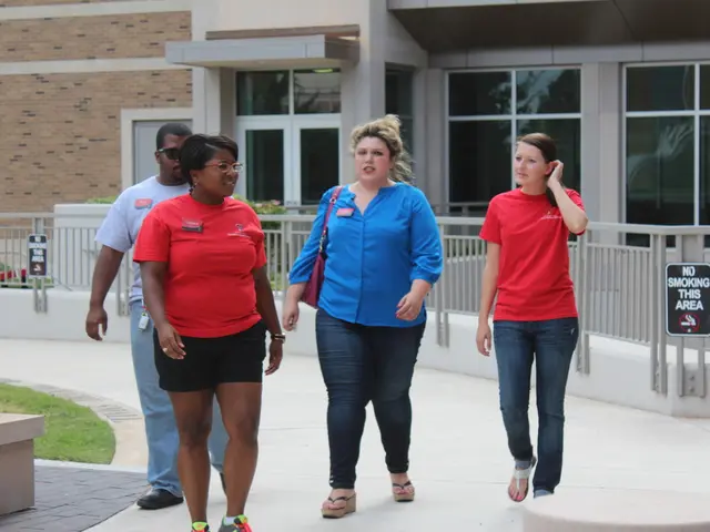In this picture I can observe four members walking in this path. Three of them are women and one of...