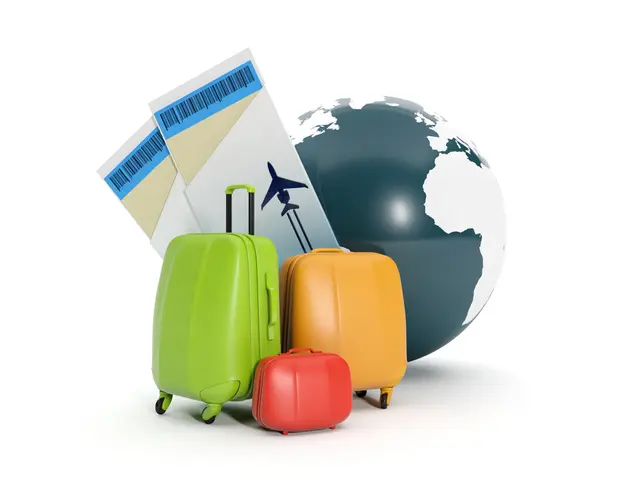 In this image we can see a globe, luggage bags and air tickets.